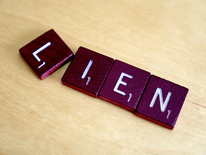 lien formed with scrabble tiles