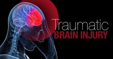 poster with a brain in red and a sign that reads "Traumatic brain injury"