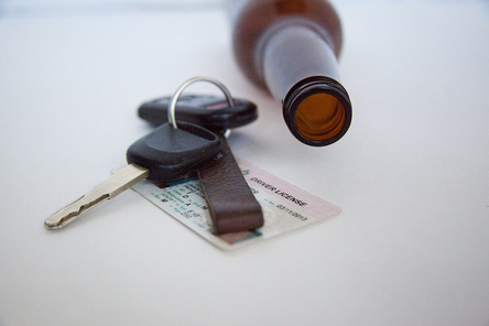 car keys and beer bottle