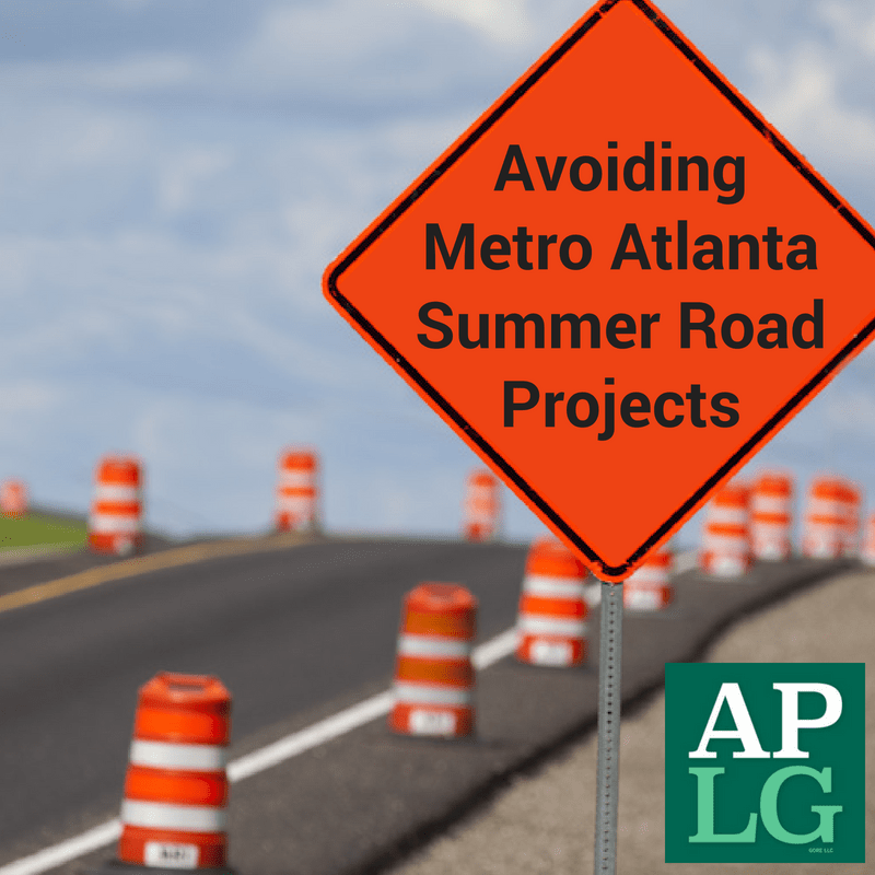 orange traffic sign that says "Avoiding metro Atlanta summer road projects"