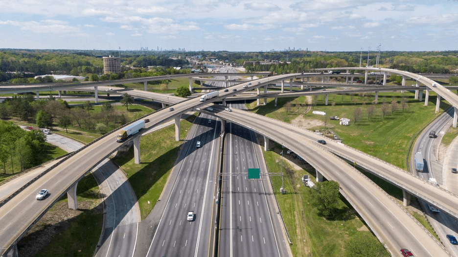 Cars driving on a non-busy highway