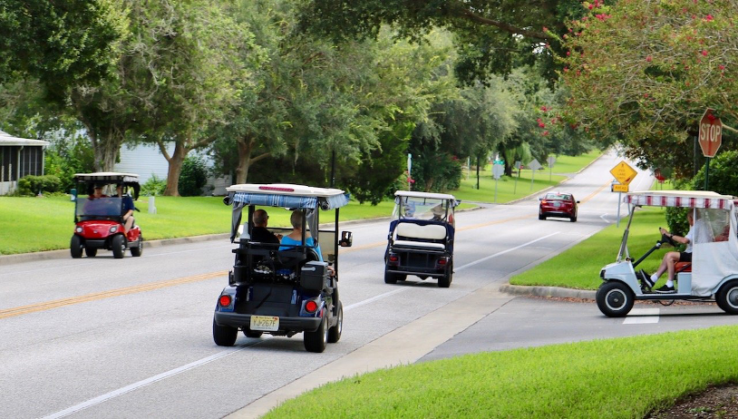 golf carts on a road
